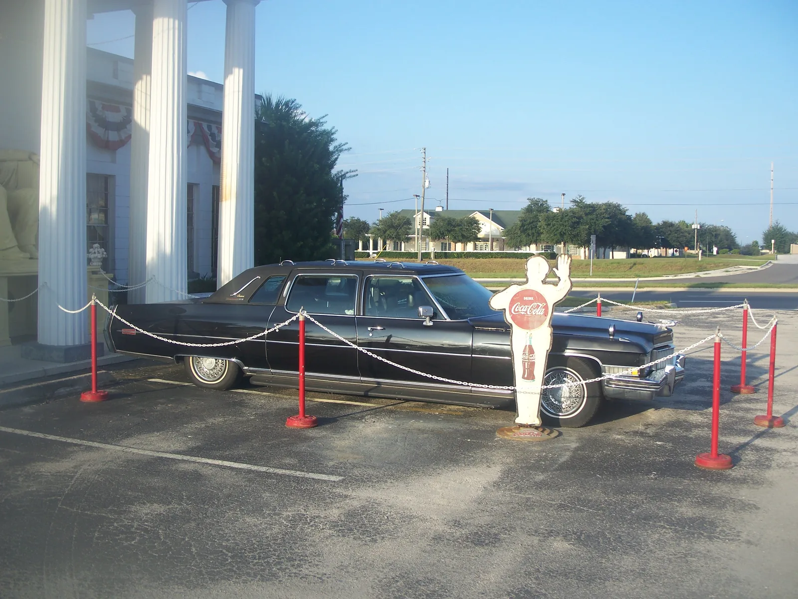 A vintage car parked outside the Presidents Hall of Fame building on U.S. 27 in Clermont.