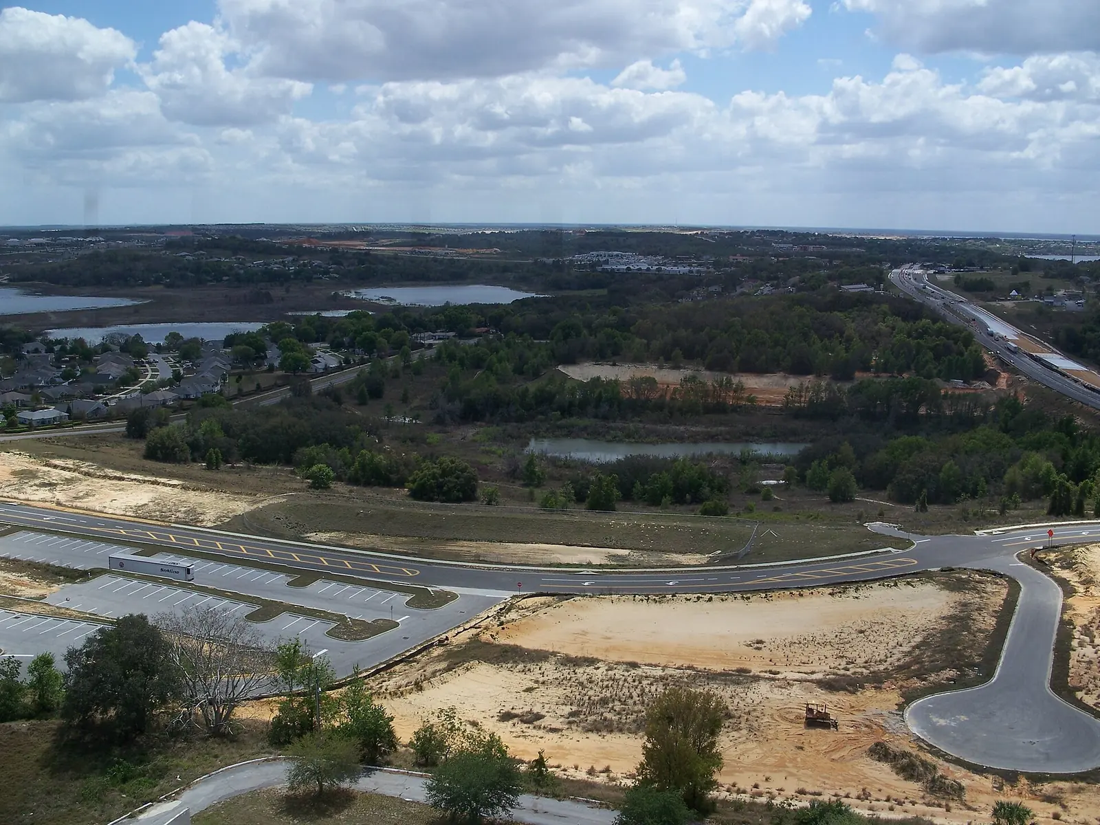 Looking south from the top of the Florida Citrus Tower, with U.S. 27 at right, toward State Road 50 and the southeast side of Clermont, where Lost Lake Elementary is